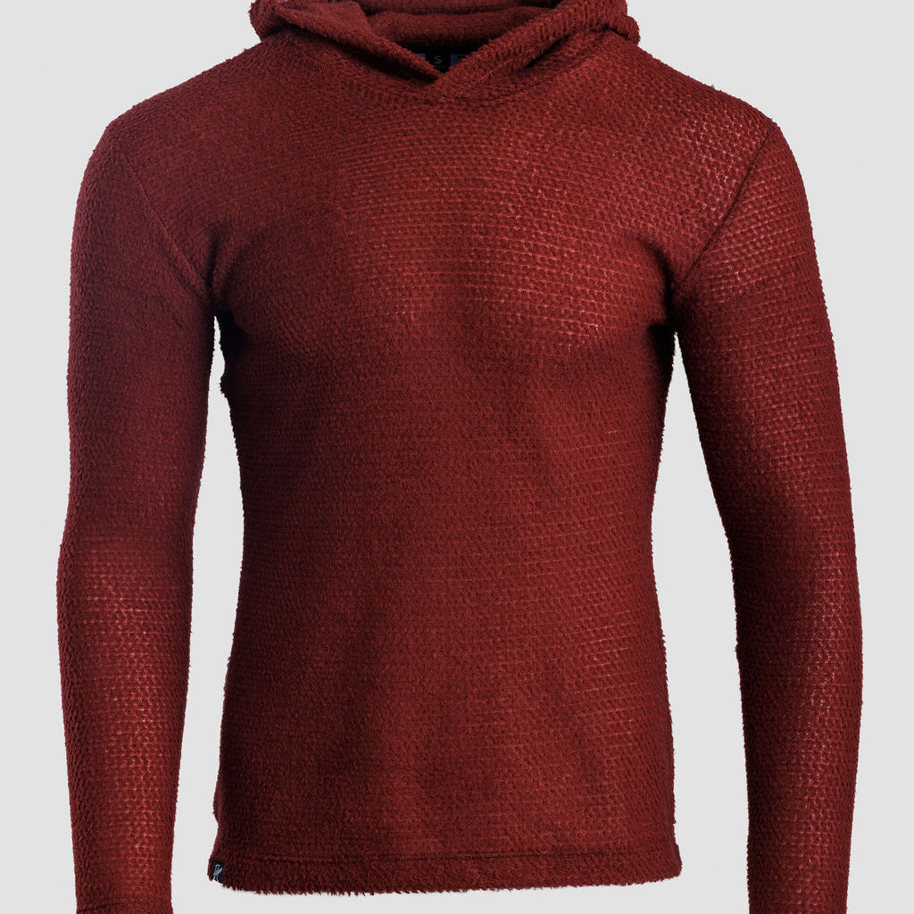 A textured Alpha 90 hoodie in a deep burgundy red, displayed on an invisible mannequin against a light gray background.