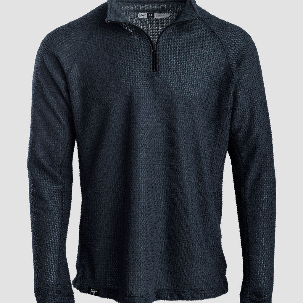 A dark navy blue quarter-zip Polartec Alpha Direct Hoodie on a neutral light gray background.