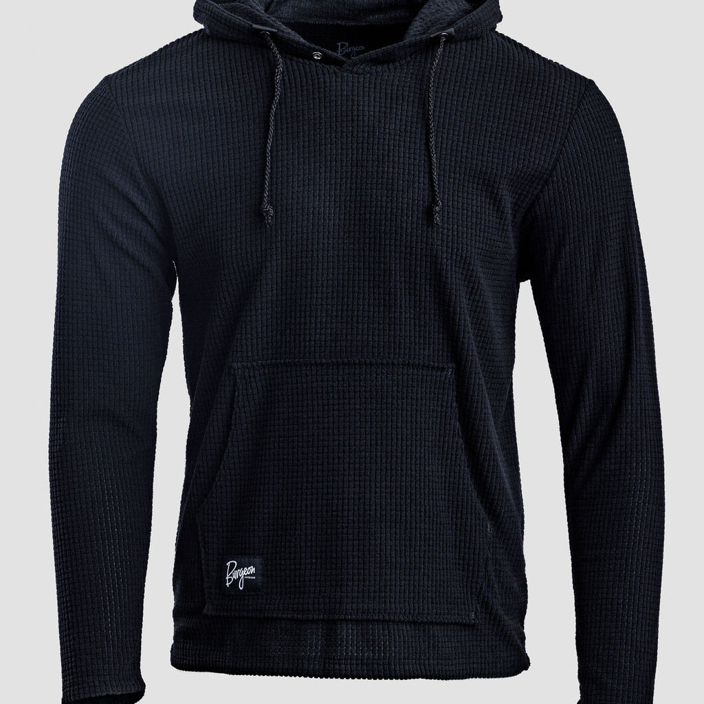 A black Highlander hoodie with a drawstring hood and kangaroo pocket, shown against a light gray background.