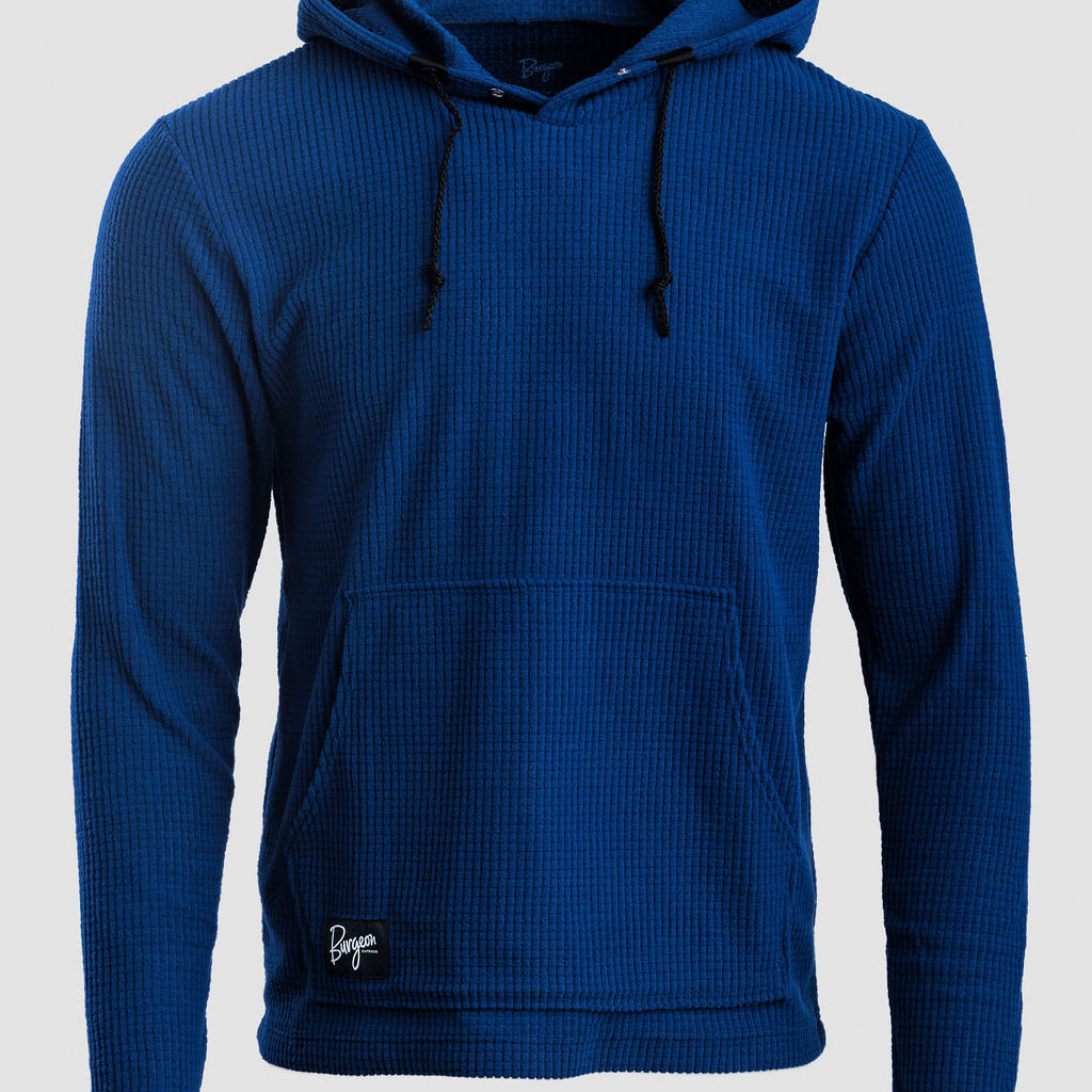 A royal blue Highlander hoodie with a drawstring hood and kangaroo pocket, shown against a light gray background.