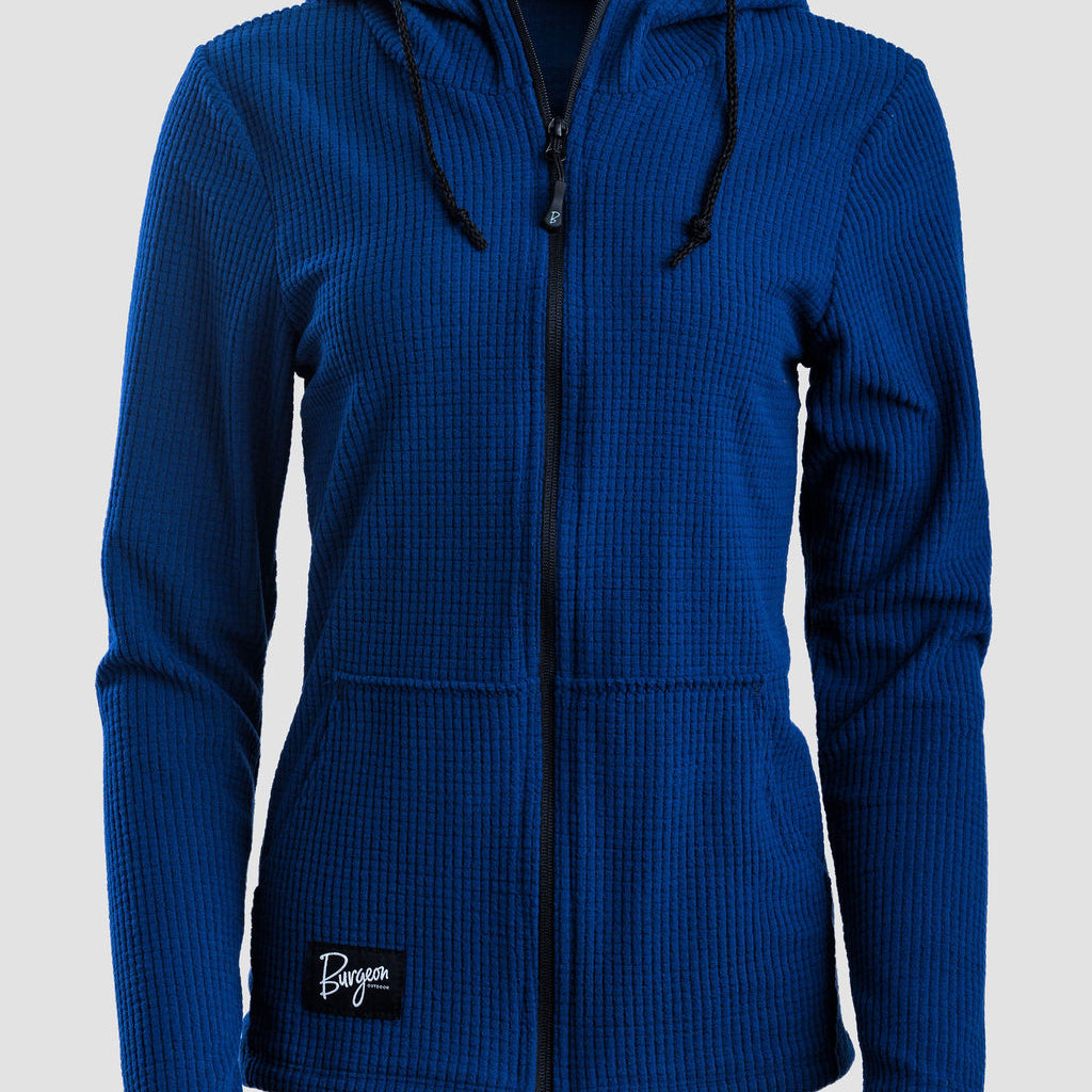 A royal blue ribbed zip-up hoodie with a drawstring hood and a small black 'Burgeon' brand patch on the lower left front, shown against a light gray background.