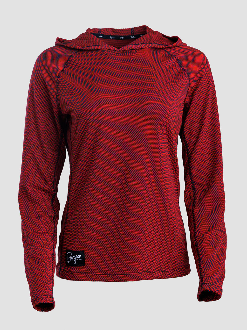 A women's long-sleeve sun hoodie in a deep red or burgundy color, featuring a textured mesh fabric and a small black brand patch near the bottom hem, shown against a light gray background.