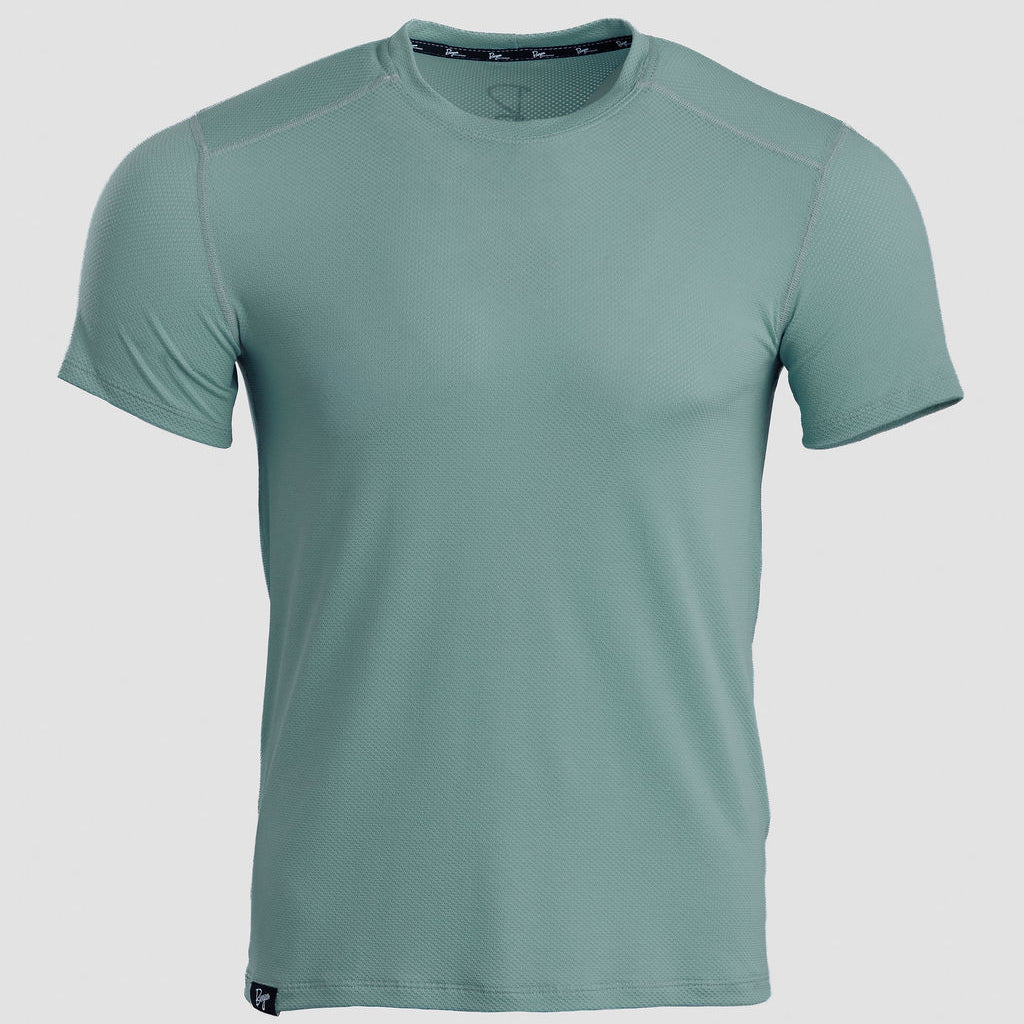 A short-sleeve athletic t-shirt in a muted sage green color, displayed on a neutral light gray background.