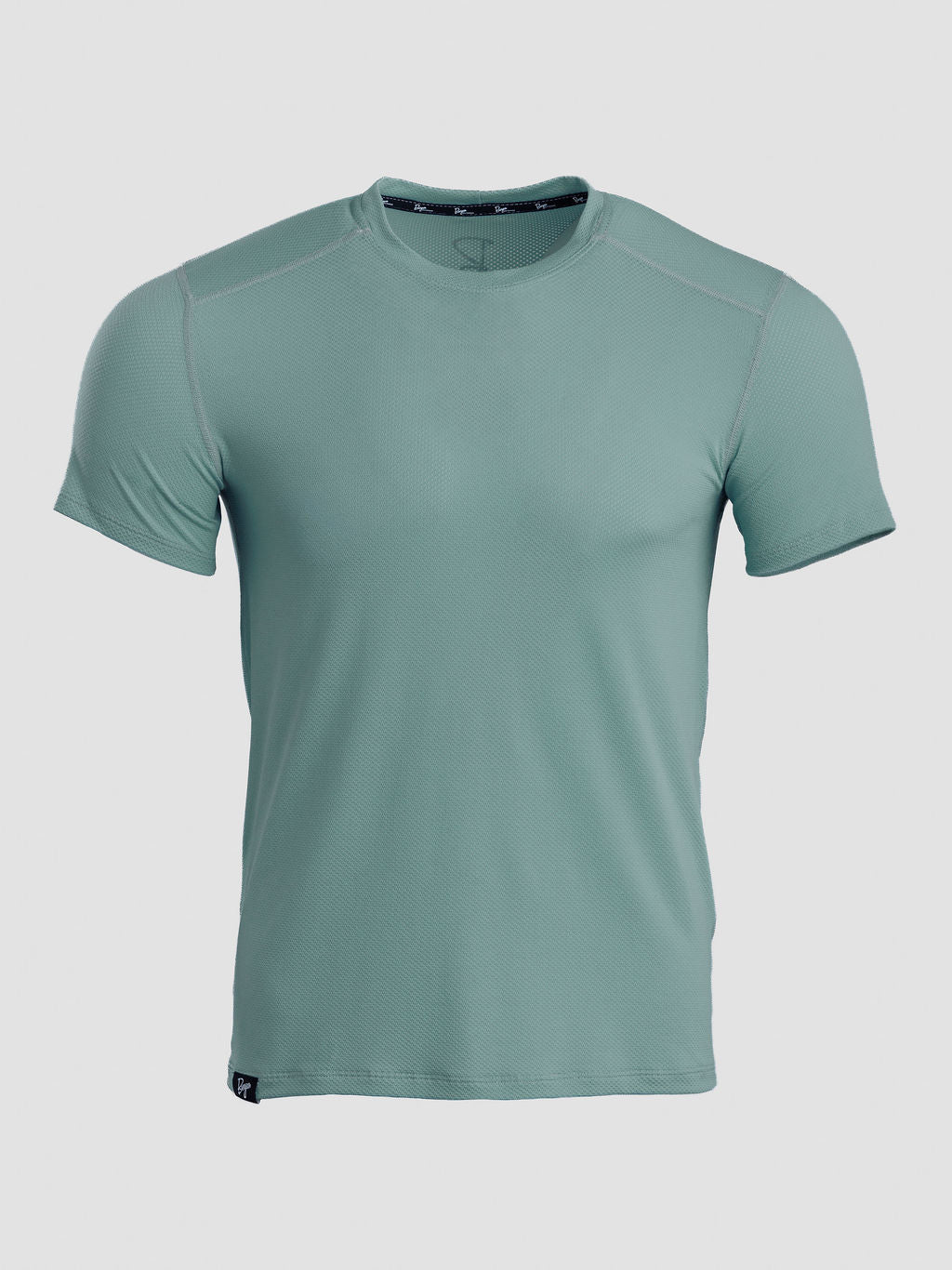 A short-sleeve athletic t-shirt in a muted sage green color, displayed on a neutral light gray background.