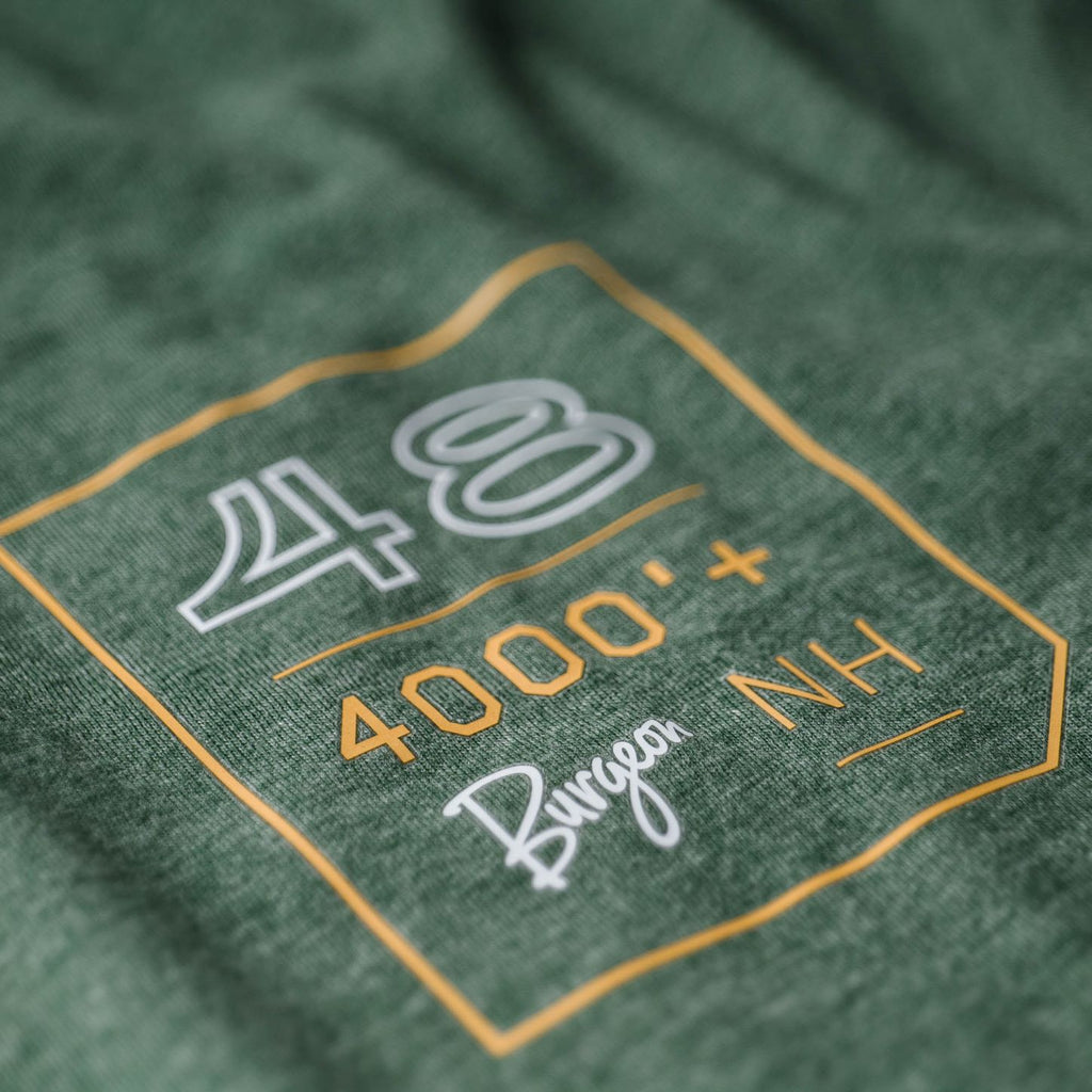 Close up of the front of shirt logo on the 4,000 Footers T-Shirt