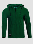 A dark green waffle-knit zip-up hoodie with a drawstring hood and a small black brand patch on the lower left hem, shown against a light gray background.