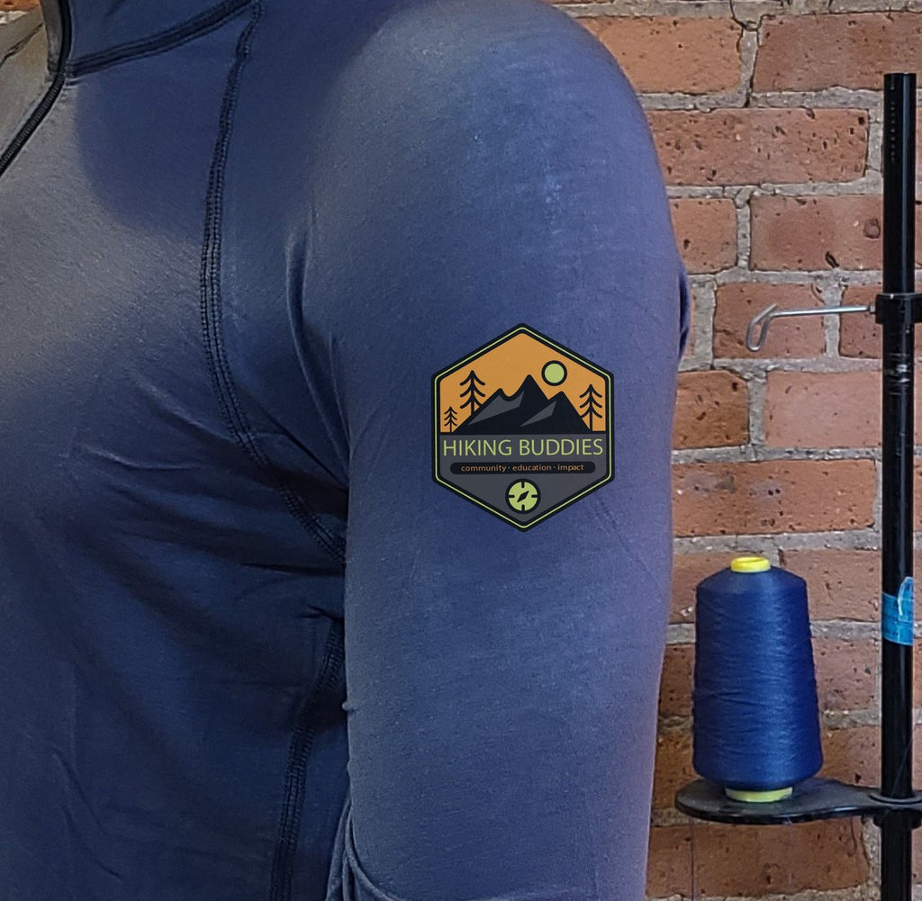 Flume with Hiking Buddies logo on sleeve