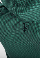Close-up of a dark green Sunseeker Hoodie fabric with a small black letter 'B' logo.