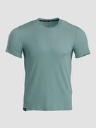 A short-sleeve athletic t-shirt in a muted sage green color, displayed on a neutral light gray background.