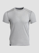 A light gray short-sleeve athletic t-shirt with a textured, breathable mesh-like fabric, displayed on a neutral light gray background.