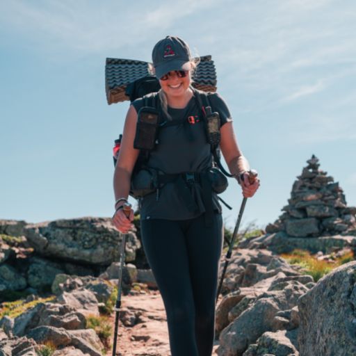 Women's Delta Cool T-Shirt in Charcoal Gray on a female hiker.